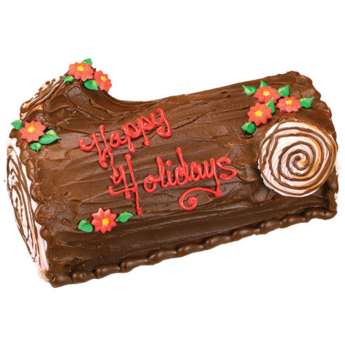 Yule log cake with "Happy Holidays" on it